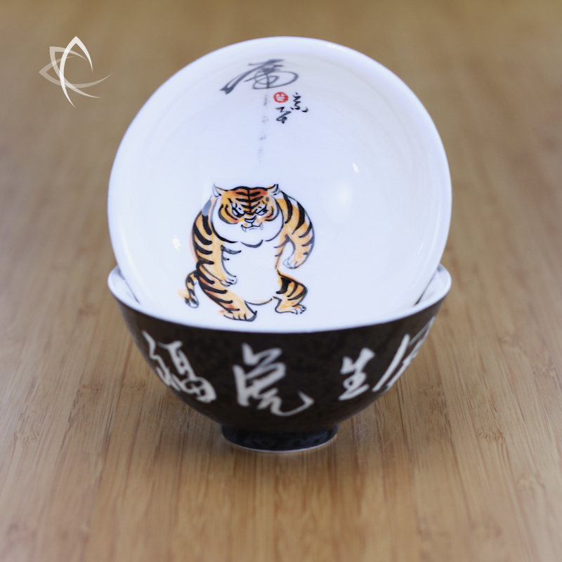 https://www.taiwanteacrafts.com/wp-content/uploads/2021/12/Hand-Painted-Year-of-the-Tiger-Tea-Cup-Design-One-Featured-View.jpg